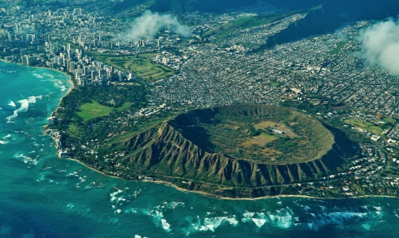 Aerial shot of the Diamond Head crater and downtown Honolulu