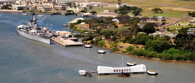 aerial view of Pearl Harbor showing the Battleship Missouri Memorial, Ford Island Field Control Tower, and the USS Arizona Memorial